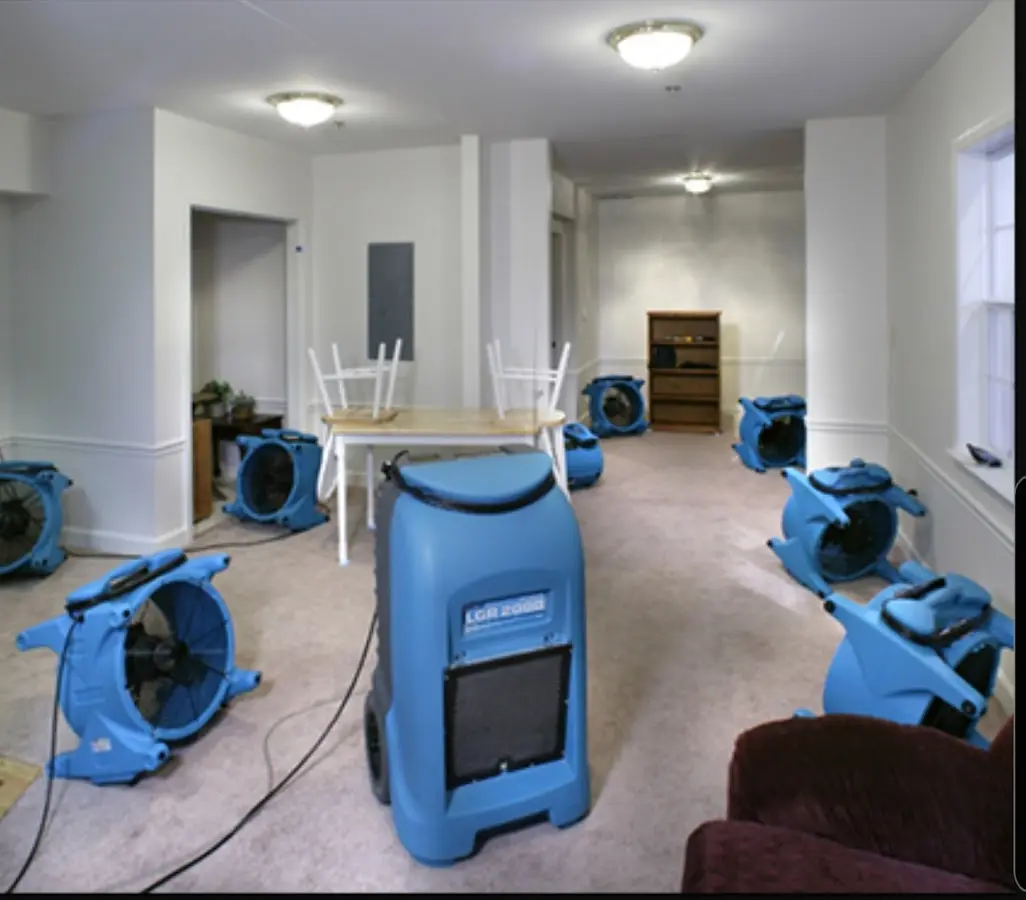 Air movers and dehumidifier setup for Water Extraction & Removal in Noble